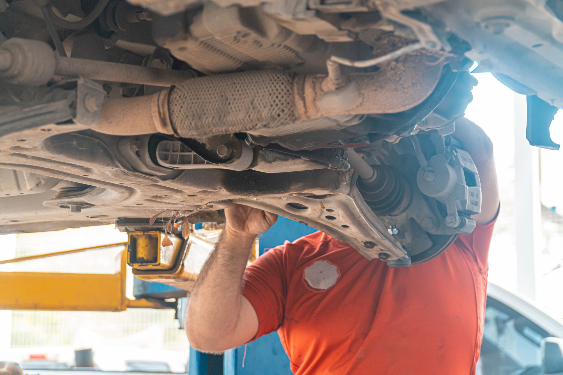 Suspension components beneath a vehicle